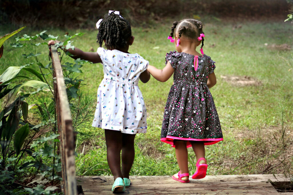 Two little girls, playing together
